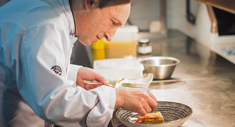 The chef Jean Marc in his kitchen in the Emperador Restaurant Jean Marc Sanz preparing a dish at the Montíboli