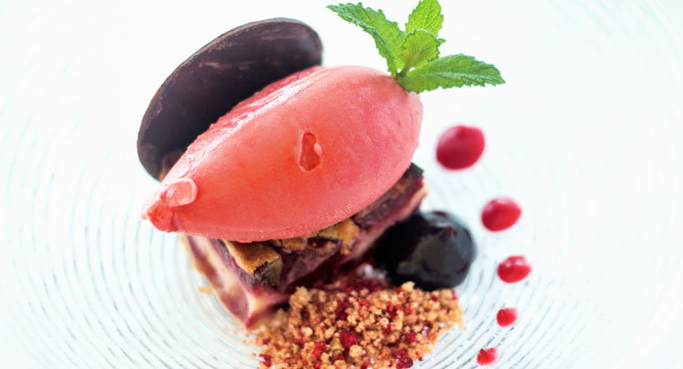 Clafoutis of cherries with aroma of matalauva and caramel of raspberries